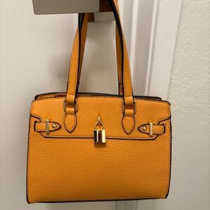 Orange faux leather designer adjacent bag
